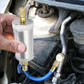 Injecteur d’huile et de traceur UV pour compresseur de climatisation automobile