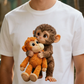 T-shirt unisexe avec motif graphique « Monkey Hugging Toy