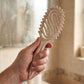 Brosse à poils de sanglier aérée pour cheveux bouclés