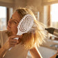 Brosse à poils de sanglier aérée pour cheveux bouclés